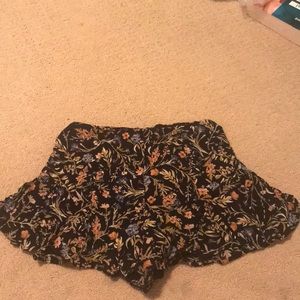 a skort with flowers and leaves